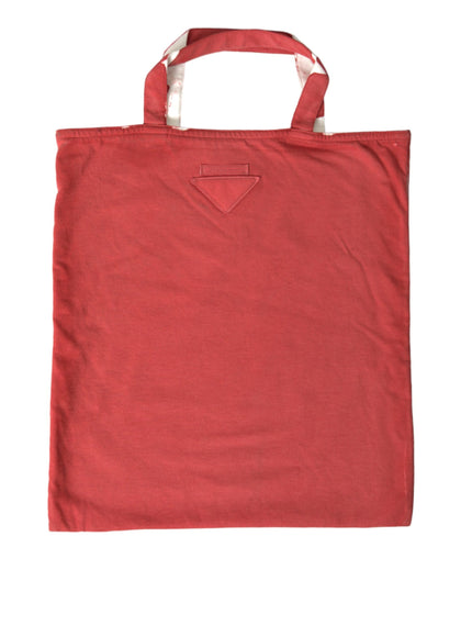 a red bag with a white handle on a white background