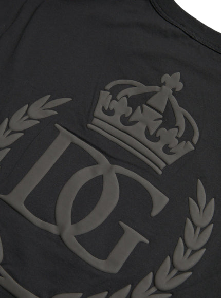 a close up of a black shirt with a crown on it