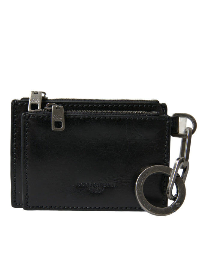 a black leather wallet with a metal keychain