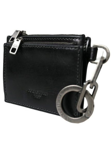 a black leather wallet with a metal keychain