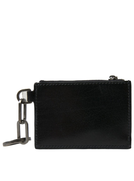 a black leather wallet with a chain hanging from it