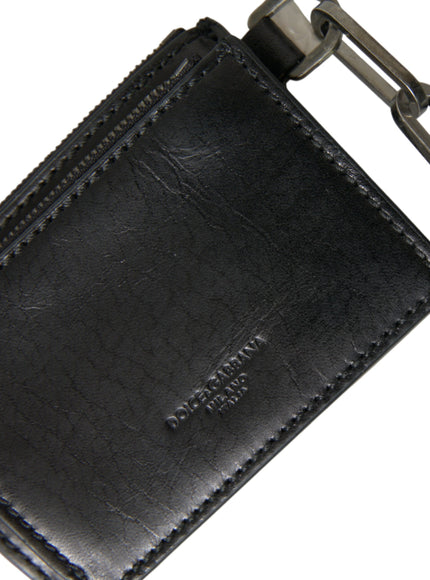 a black leather wallet with a metal clip