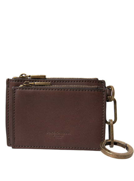 a brown leather wallet with a metal keychain