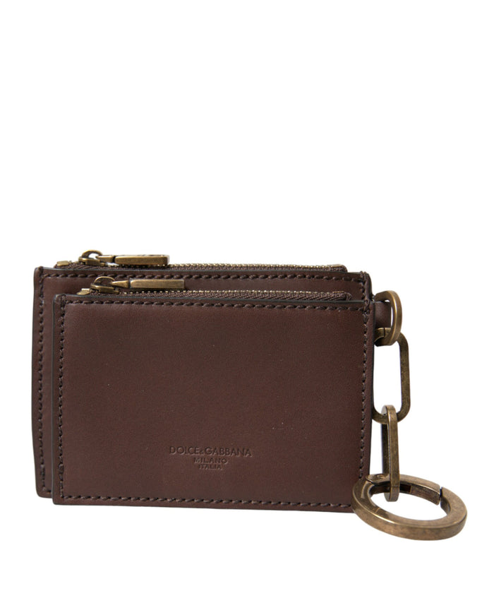 a brown leather wallet with a metal keychain