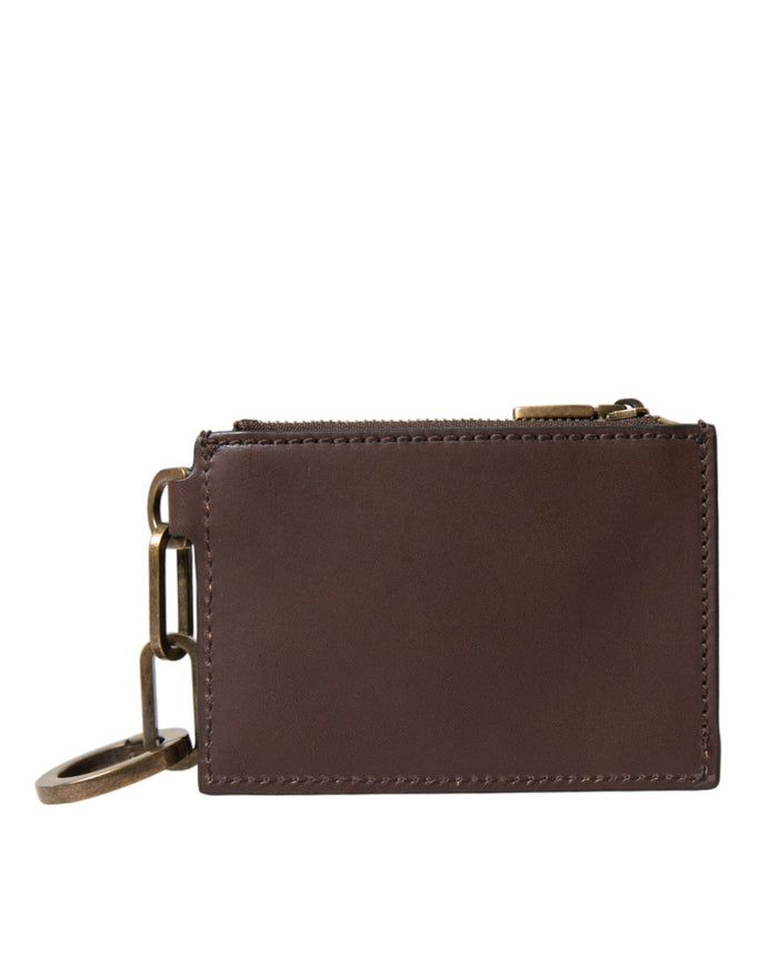 a brown leather wallet with a key chain