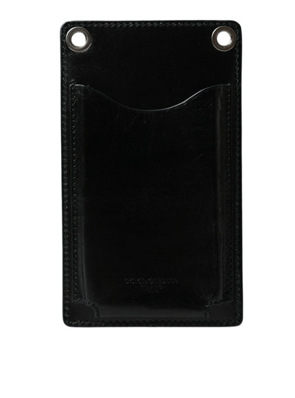 a black leather card case with two holes