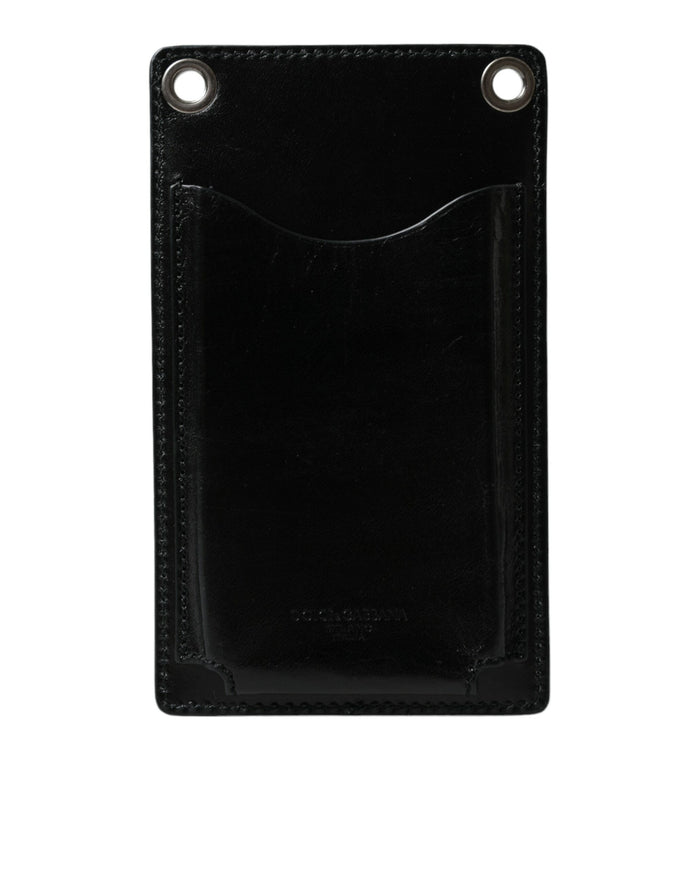 a black leather card case with two holes