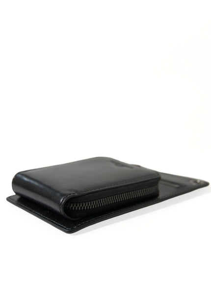 a black wallet sitting on top of a white table