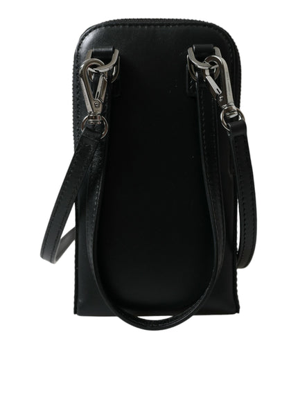 a black purse with two handles and a strap