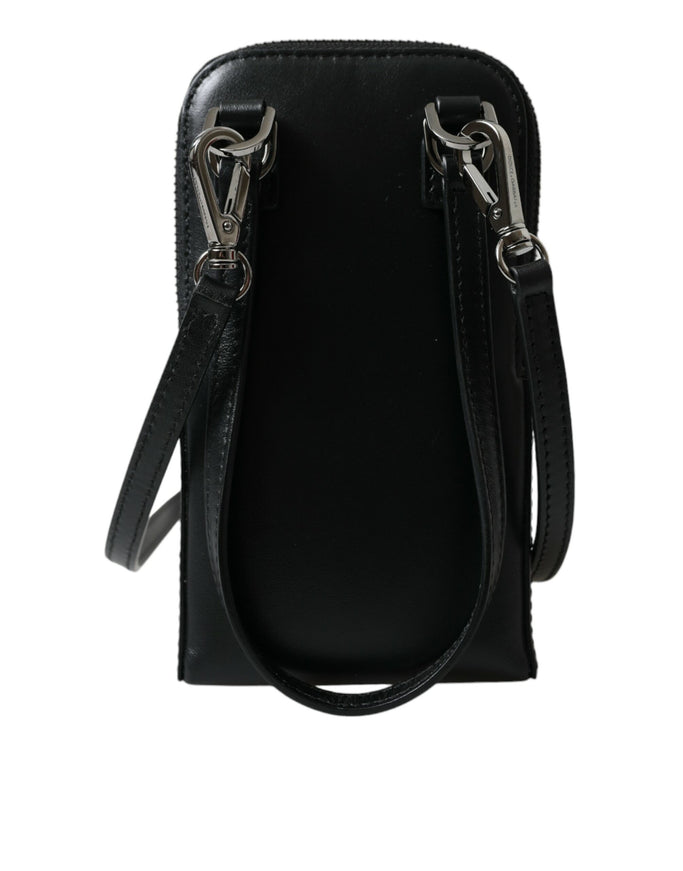 a black purse with two handles and a strap