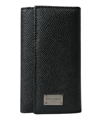 a black leather wallet on a white background