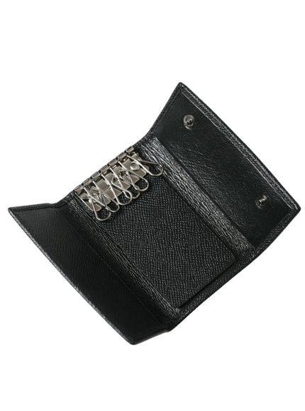 a black leather wallet with a chain on it