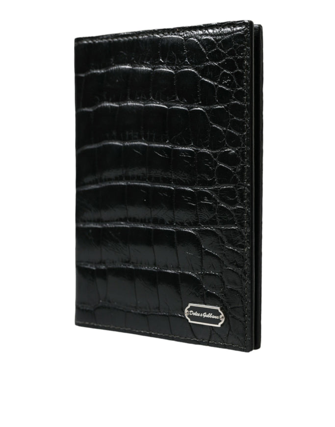 a black alligator skin wallet on a white background