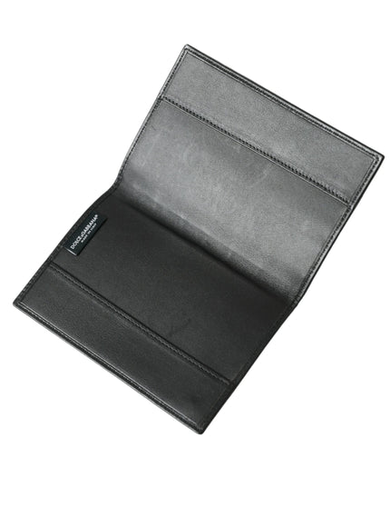 a black leather wallet on a white background