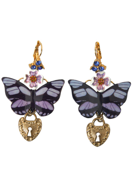 a pair of earrings with a butterfly on it