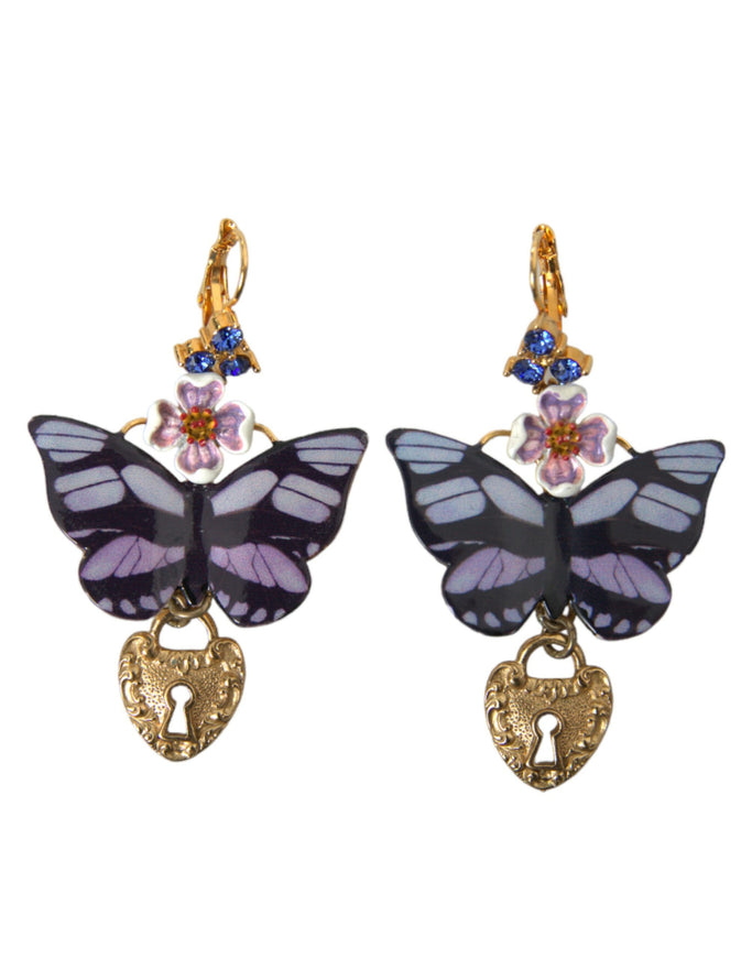 a pair of earrings with a butterfly on it