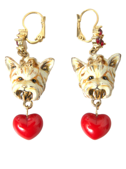 a pair of earrings with a dog and a heart