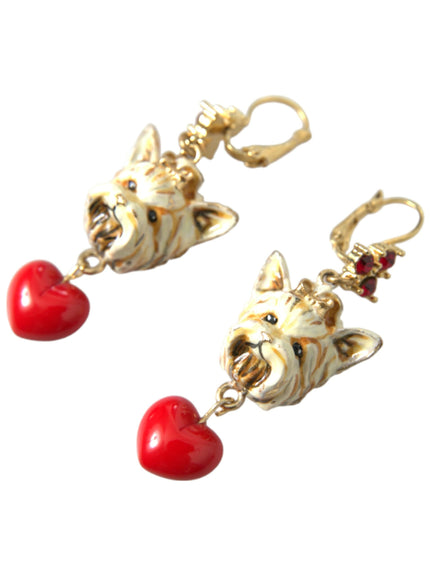 a pair of earrings with a dog and a heart