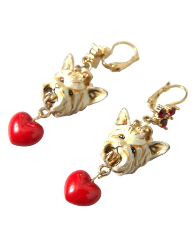 a pair of earrings with a dog and a heart