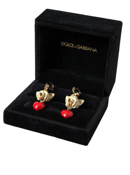 a pair of earrings in a black box