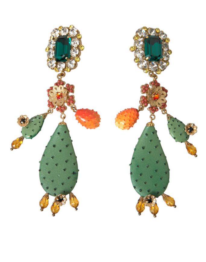 a pair of green and orange earrings