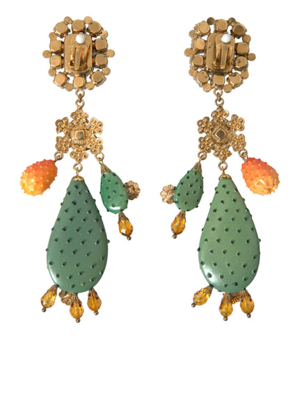 a pair of green and yellow earrings