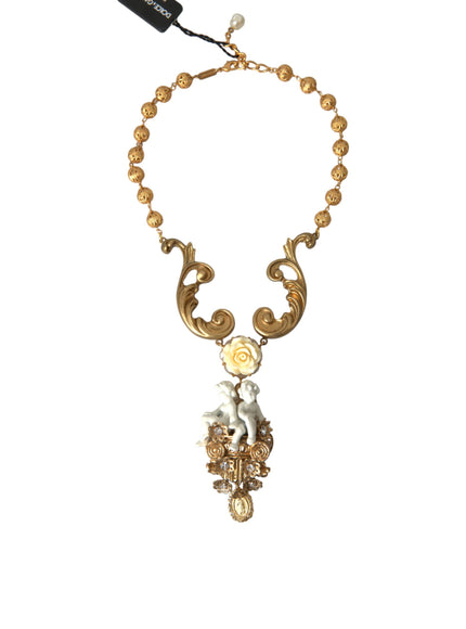 a necklace with a gold and white design on it