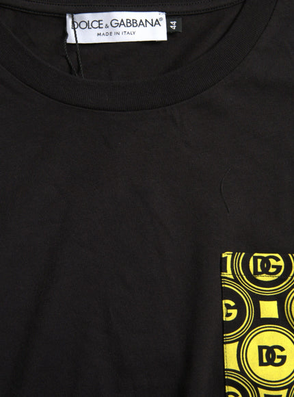 a black t - shirt with yellow and black circles on it