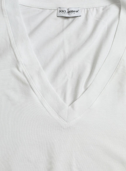 a close up of a white shirt with a tag on it