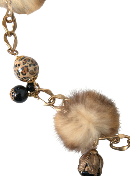 a key chain with a fur ball on it