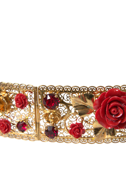 a close up of a bracelet with a rose on it