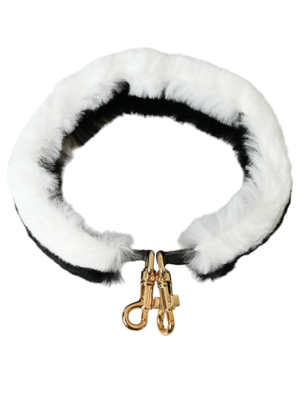 a white fur collar with gold hardware