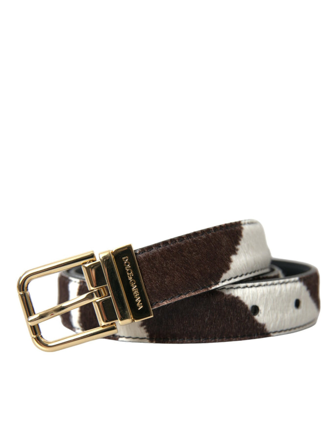 a brown and white belt with a gold buckle