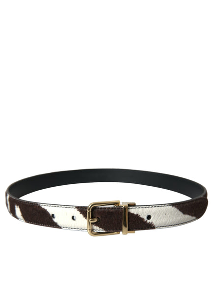 a white and brown belt with a gold buckle