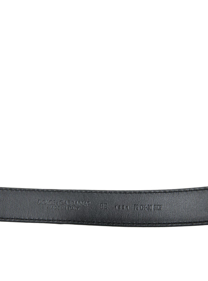 a close up of a black belt on a white background