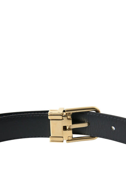 a close up of a belt with a gold buckle