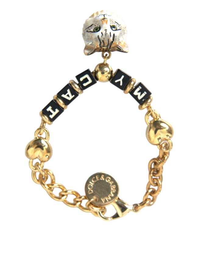 a gold bracelet with a charm that says nach on it