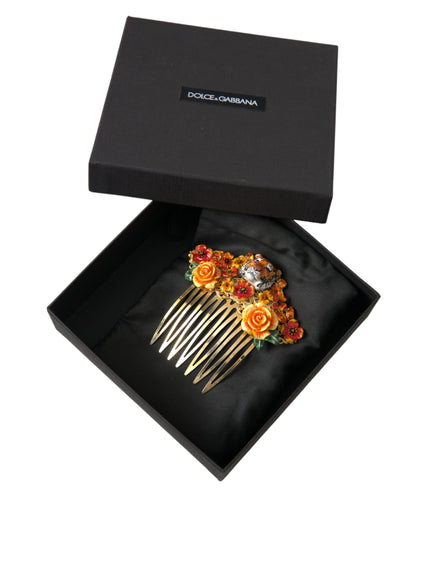 a black box with a flowered comb in it