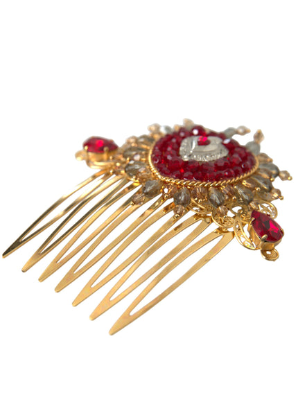 a close up of a hair comb with a red brooch