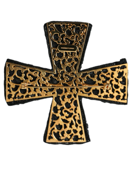 a gold and black cross with leopard print