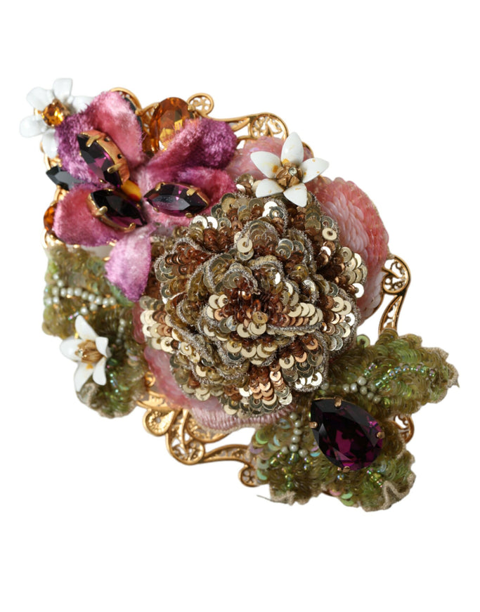 a close up of a brooch on a white background