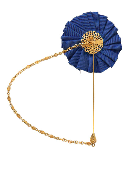 a blue fan with a gold chain attached to it