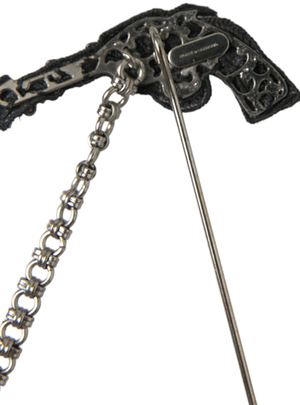 a metal hook with a chain attached to it