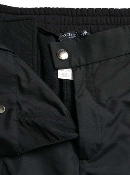 a close up of a black pants with a label on it