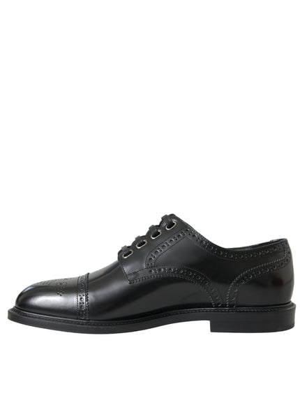 a black derby shoe with a black rubber sole