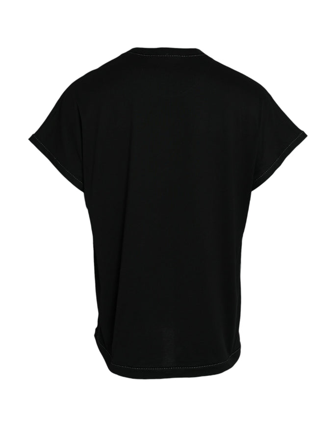 the back of a woman's black shirt