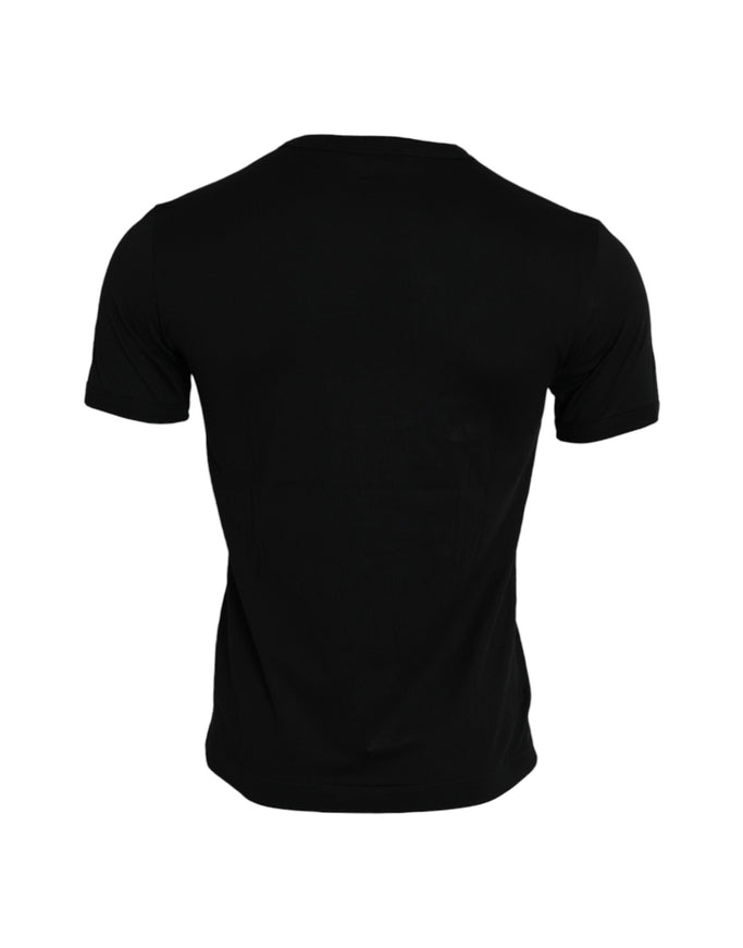 the back of a black t - shirt on a white background