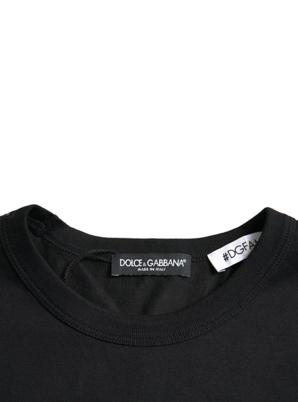 a black t - shirt with a tag on it