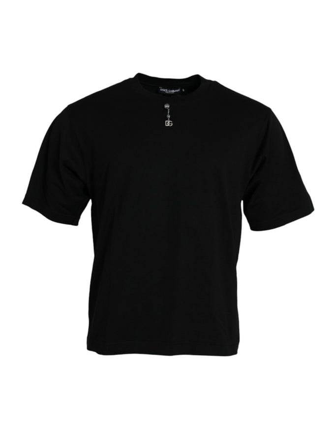 a black t - shirt with a cross on the chest