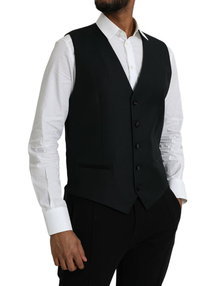 a man wearing a black vest and white shirt